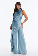 0627 SIZE:1X FASHION NOVA LIGHT BLUE DRAPED WIDE LEG JUMPSUIT W/OPEN BACK, HALTER NECKLINE, SIDE ZIPPER CLOSURE, AND DRAPING ACCENTS NWT RTL:$59.99