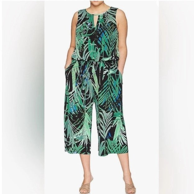 0808 SIZE:16 LONDON TIMES GREEN&BLACK PALM LEAF PATTERN SLVLSS JUMPSUIT W/HALTER NECKLINE, CONCEALED BACK ZIPPER CLOSURE, KEYHOLE DETAIL, FLOUNCE TOP AND COOR BELT RTL:$39.99